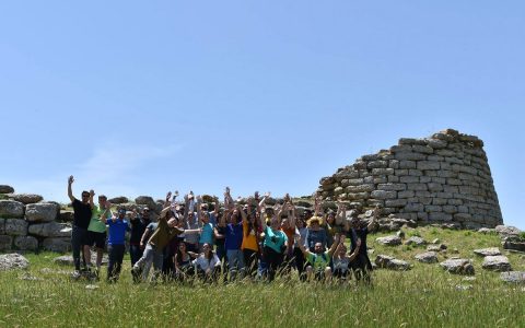 Spanish teenagers visiting the nuraghe