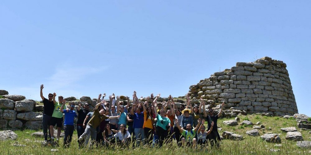 Spanish teenagers visiting the nuraghe